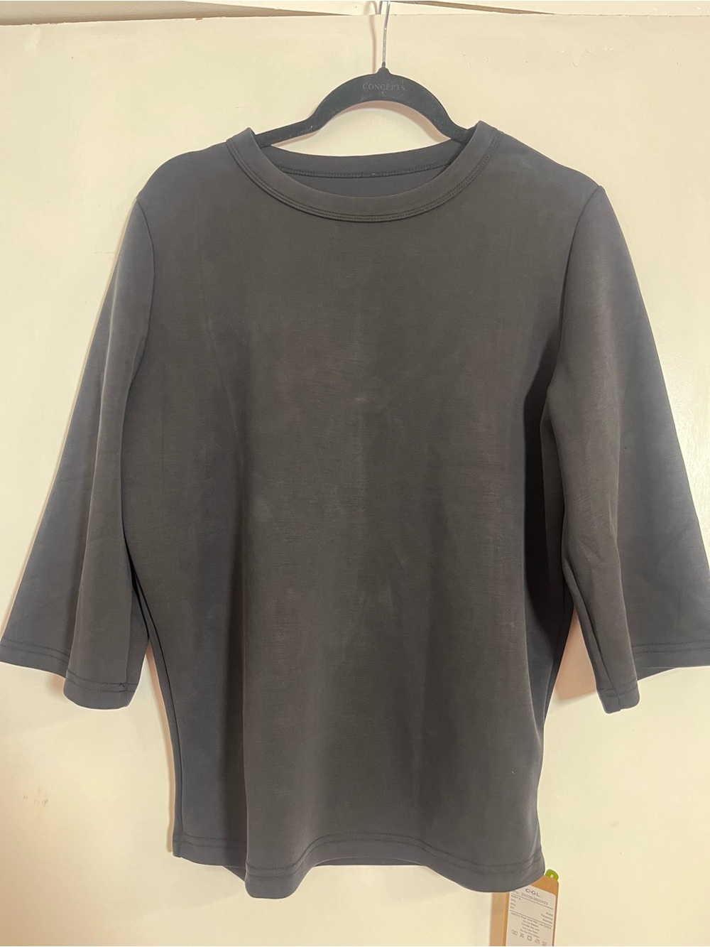 OGL Black Crew Neck Top with Green Tag Accent